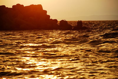 Scenic view of sea against sky during sunset