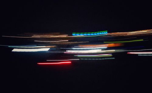 Light trails on illuminated city at night