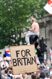 Person holding placard during protest