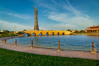 Aspire park doha qatar daylight view with fountain and the torch doha hotel in background