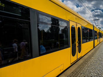 Train on railroad station platform against sky