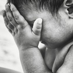 Close-up portrait of baby hands