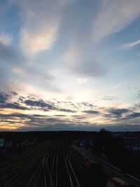 Train against sky at sunset