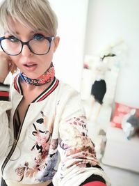 Portrait of smiling woman at home