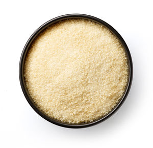 Directly above shot of bread in bowl against white background