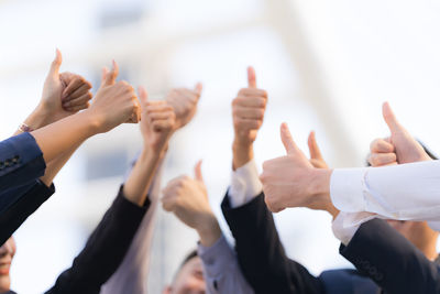 Group of people enjoying in hands
