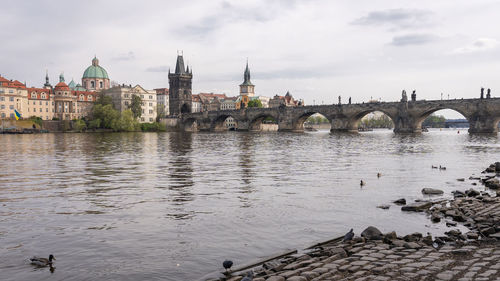 Bridge over river against sky