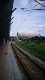 Railroad station platform against sky