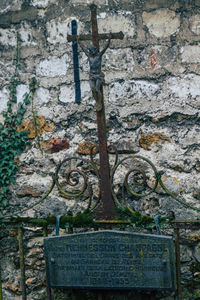 Text on stone wall