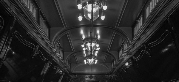 Low angle view of illuminated chandelier