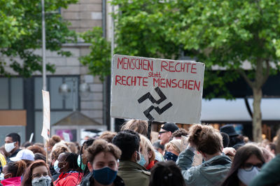 Group of people on street in city