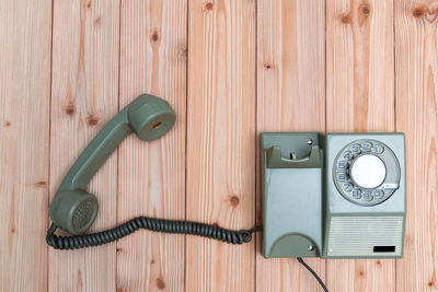 High angle view of telephone on table