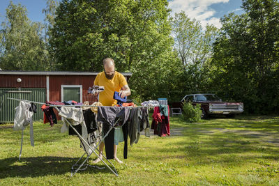 Man hanging laundry