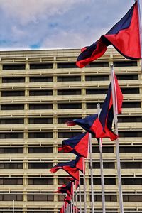 Low angle view of flag against sky