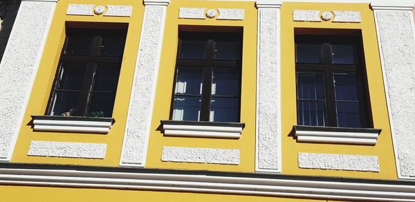 Low angle view of yellow building