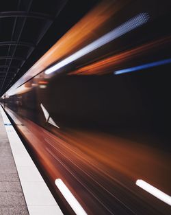 Blurred motion of train at subway station