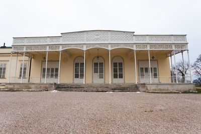 Low angle view of old building against clear sky