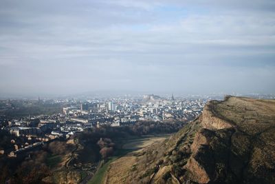 High angle view of city buildings against sky