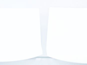 Close-up of open book against white background