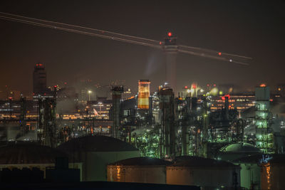 Illuminated buildings in city at night