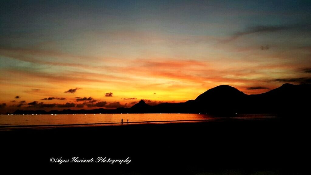 sunset, mountain, scenics, tranquil scene, water, beauty in nature, tranquility, silhouette, sky, sea, mountain range, orange color, idyllic, nature, cloud - sky, dusk, lake, cloud, majestic, reflection