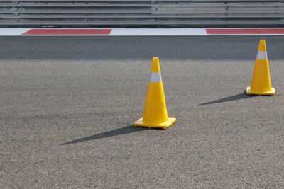 Yellow traffic cones on street