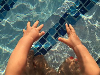 High angle view of woman swimming in pool