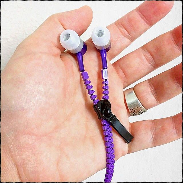 person, part of, holding, lifestyles, fashion, leisure activity, close-up, bracelet, jewelry, human finger, indoors, cropped, personal perspective, multi colored, nail polish, studio shot