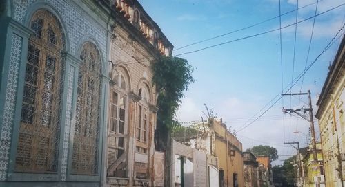Low angle view of buildings against sky