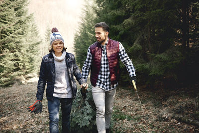 Young couple kissing in forest