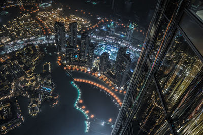 Illuminated modern cityscape seen from burj khalifa at night