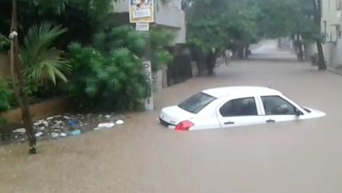 Close-up of car on road