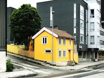 Yellow building against sky