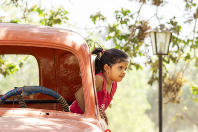 Portrait of boy in car