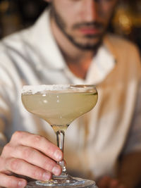 Midsection of man holding ice cream