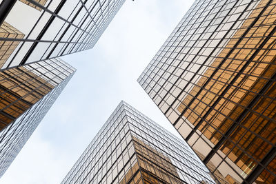 Low angle view of modern buildings against sky