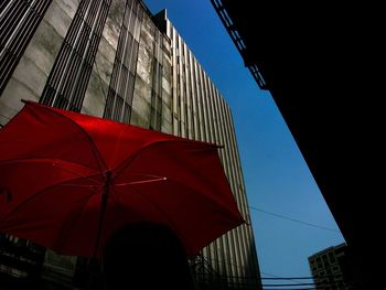 Low angle view of skyscrapers against clear sky