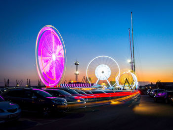 Illuminated ferris wheel in harbour area in varna. 