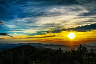 Scenic view of mountains at sunset