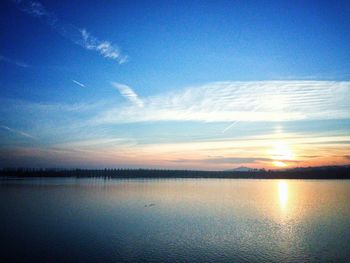 Scenic view of sea against sky at sunset