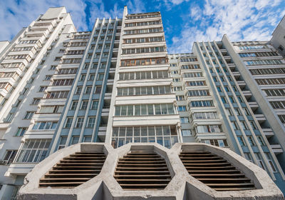 Low angle view of modern buildings against sky