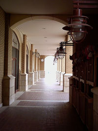 Empty corridor along buildings