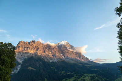 Scenic view of mountains against sky grindlewald