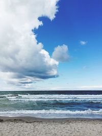 Scenic view of beach against sky