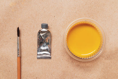 High angle view of paintbrushes on table