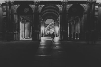 People in corridor of temple