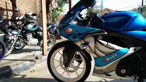 Side view of bicycles parked on street