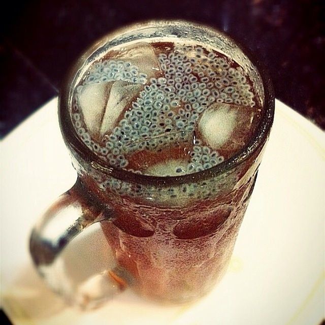 indoors, close-up, still life, food and drink, focus on foreground, drink, table, metal, refreshment, no people, selective focus, coffee cup, metallic, freshness, single object, high angle view, day, glass - material, container, old