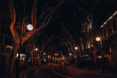 Illuminated street at night