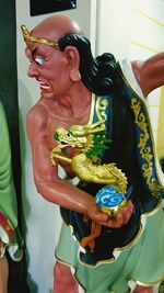 Close-up of woman standing in pond